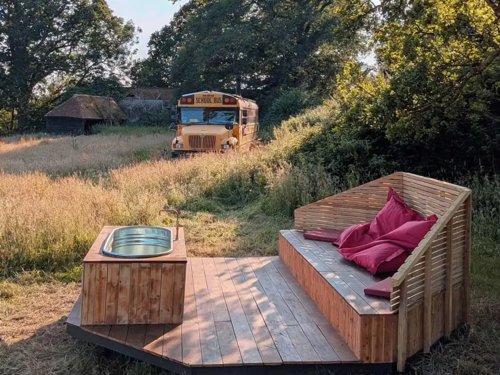 wood fired hot tub at skoolie stays cabin glamping in Sussex