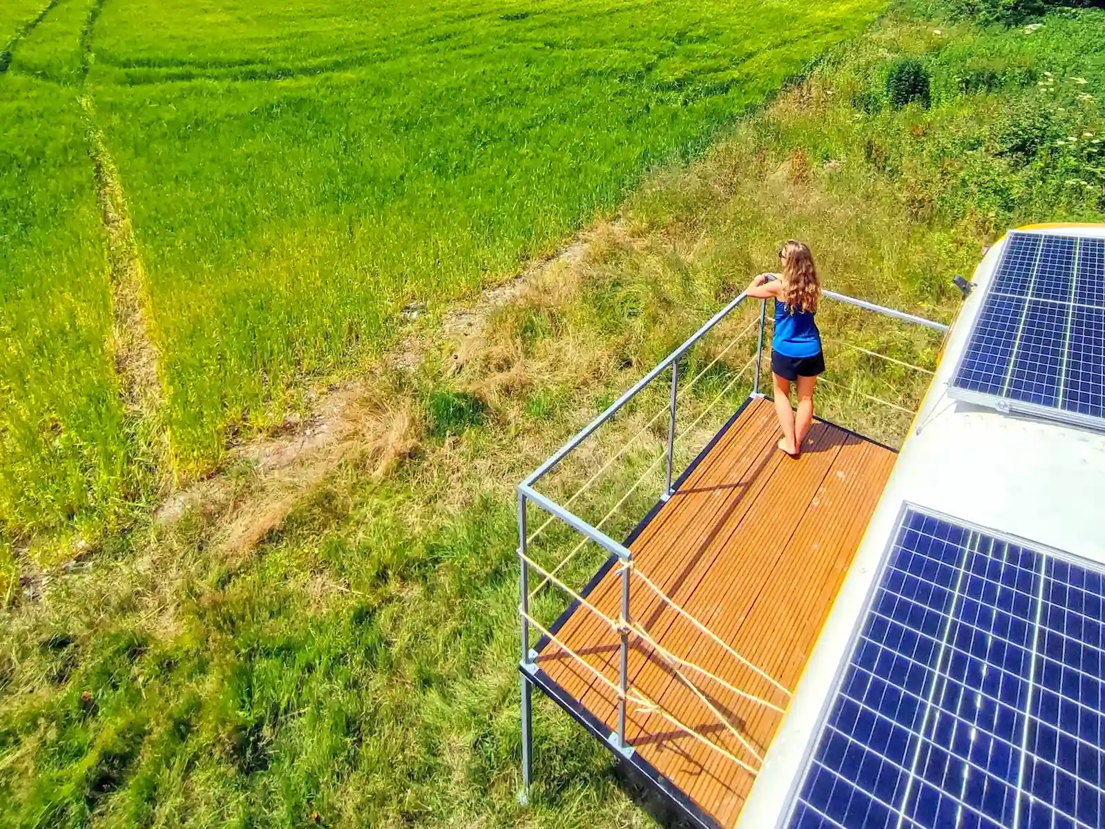 private outside sun terrace at skoolie stays american school bus glamping