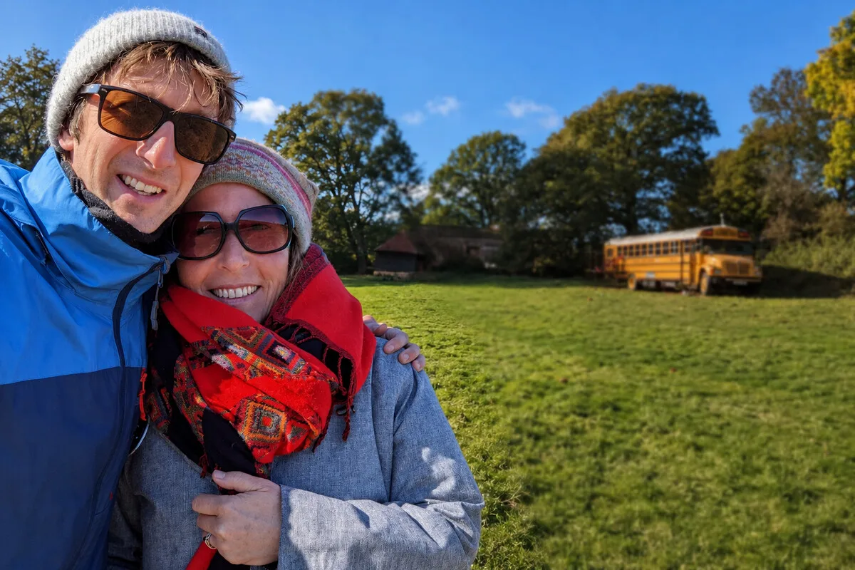 Couple enjoying a digital detox break at Skoolie Stays in Sussex